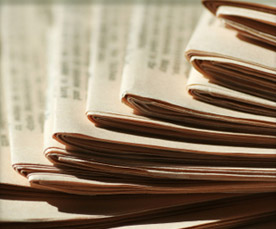 Photo of stacks of newspapers